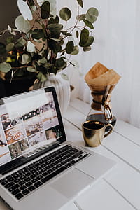 Apple MacBook & Coffee on the white desk thumbnail