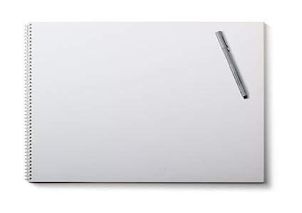 white sketch pad and silver pen on top thumbnail