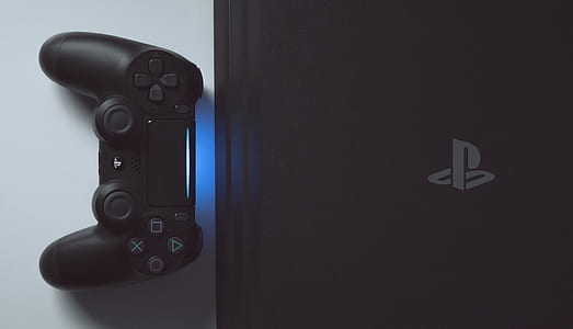 Sony PS4 with controller thumbnail