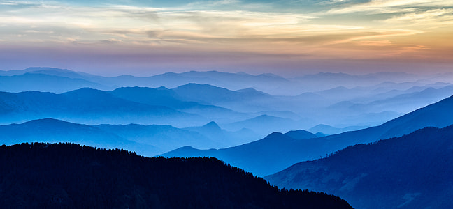silhouette of hills during golden hour thumbnail