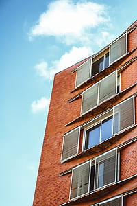 low angle of red brick building thumbnail