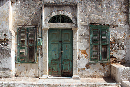 photo of closed green wooden door thumbnail