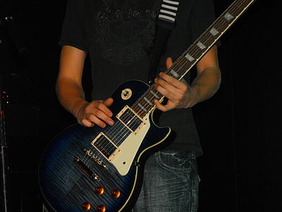 man playing electric guitar thumbnail