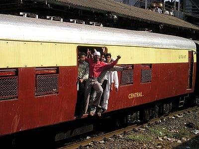 group of men riding yellow and red train thumbnail
