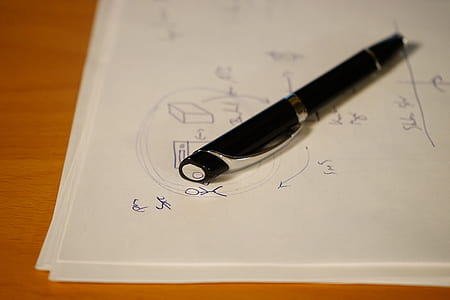 black pen on white paper thumbnail