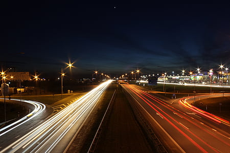 time-lapse photography of car lights on road thumbnail