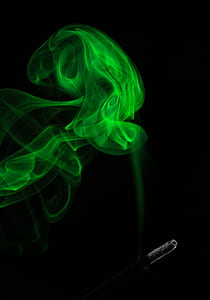 person holding cigarette stick smoking thumbnail