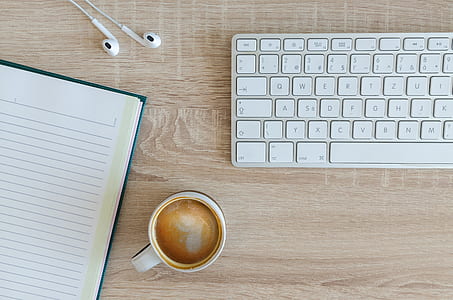 mug near computer keyboard thumbnail
