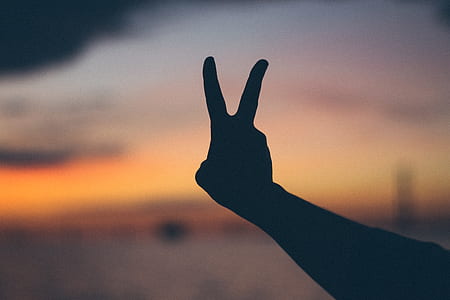 silhouette of peace hand sign thumbnail
