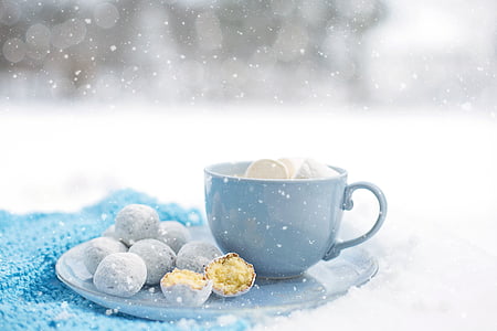closeup photo of blue ceramic tea cup thumbnail