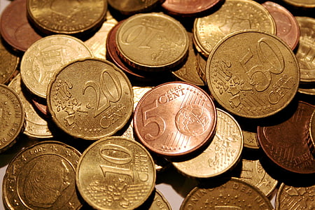close-up photography of round gold-colored Euro cents coins thumbnail