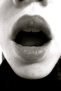grayscale photography of person's lips thumbnail