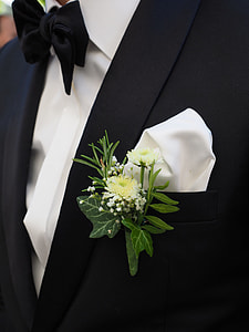 closeup photo of white and green flowers on tuxedo thumbnail