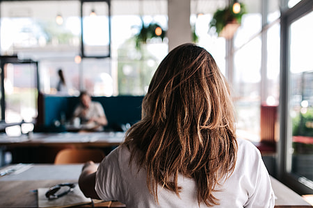 Young woman working in a cafe thumbnail
