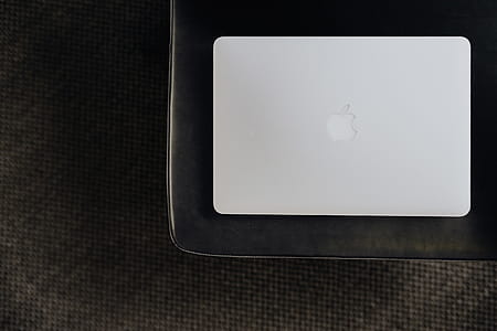 Stylish workspace with MacBook computer on home or studio thumbnail