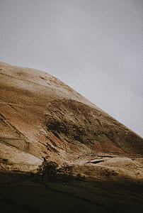 brown mountain photo taken during daytime thumbnail