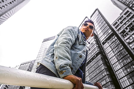 man wearing blue denim jacket thumbnail