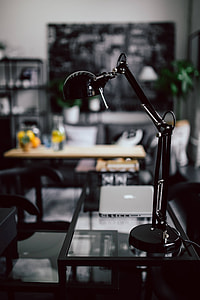 Organized desk with laptop and journals thumbnail