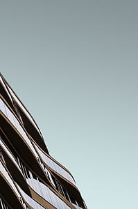 low angle photography of white and brown building thumbnail