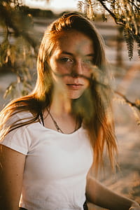 woman wearing white top thumbnail