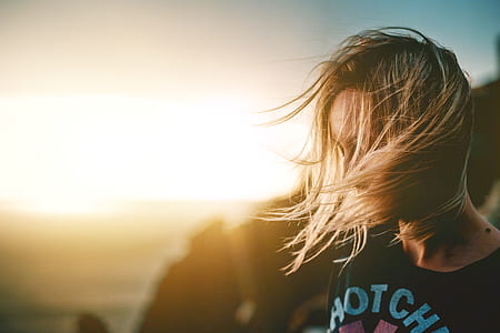 selective focus photo of person in black Hot Chili Pepper-printed shirt thumbnail