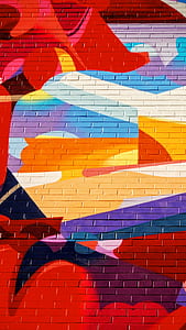 closeup photo of multicolored graffiti wall art thumbnail