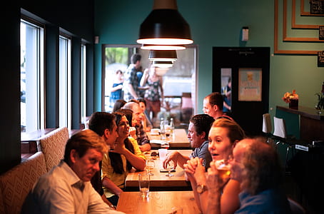 group of people gathered on restaurant thumbnail