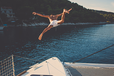 man in white shorts jumps on water thumbnail