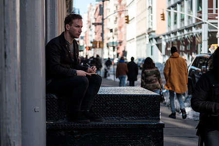 man sitting on staircase thumbnail