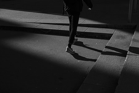 person waling near concrete stairs thumbnail
