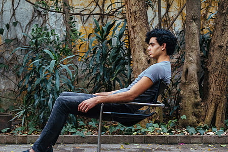 man sitting on chair thumbnail