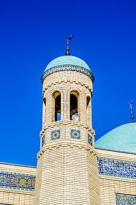 Brown Concrete Mosque Under Blue Sky during Daytime thumbnail