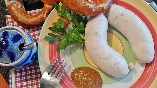 doughnut, oval white vegetables, and fork on plate thumbnail