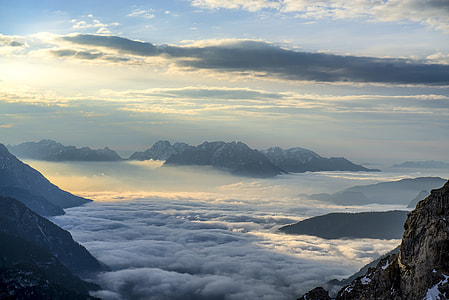 top view of mountain covered by clouds thumbnail