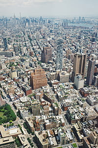 bird's eye view photography of city during daytime thumbnail