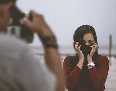 woman wearing red long-sleeve shirt thumbnail