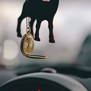 round gold-colored pocket watch thumbnail