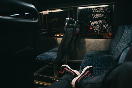 person lying on passenger seat at the back thumbnail