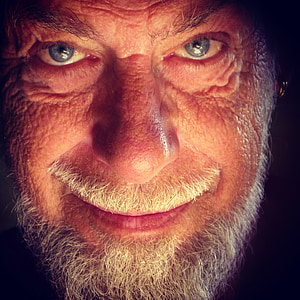 close-up photography of bearded man thumbnail