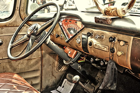 close up photography of brown and black vehicle steering wheel thumbnail