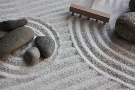 gray stones and white sand thumbnail