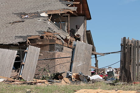 wrecked house under blue sky thumbnail