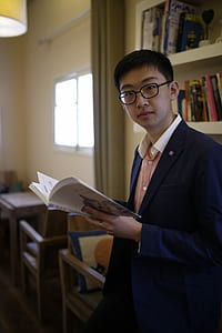 boy holding book thumbnail