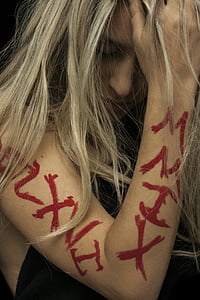 woman with arm calligraphy painting thumbnail