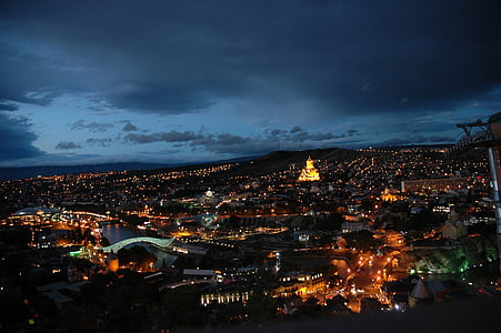 aerial photography of city buildings during night time thumbnail