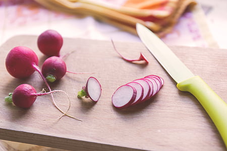 sliced onion on brown chop board thumbnail