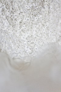 white floral lace textile with gemstones thumbnail