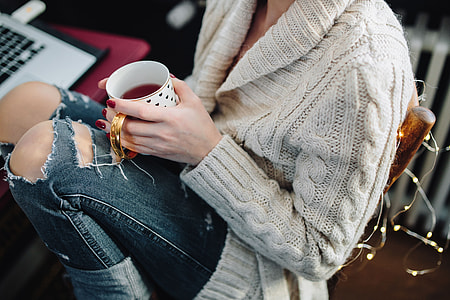 Woman drinking hot tea in her home office thumbnail