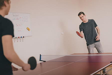 man playing ping pong thumbnail