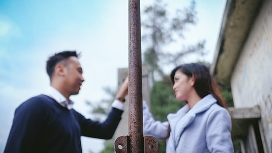 man and woman posing for a photo outdoor during daytime thumbnail